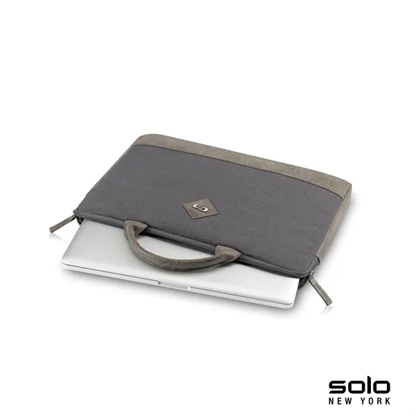 Solo Pilot two-tone slim brief; includes turquoise lining and protects laptops... from ASI 67866 Logomark/Valumark
