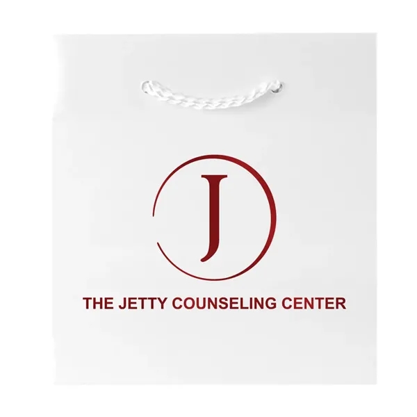 Made from 180 GSM gloss laminated paper, these shopping totes feature... from ASI 75731 PWS / Pacific Western Sales/Cater Line