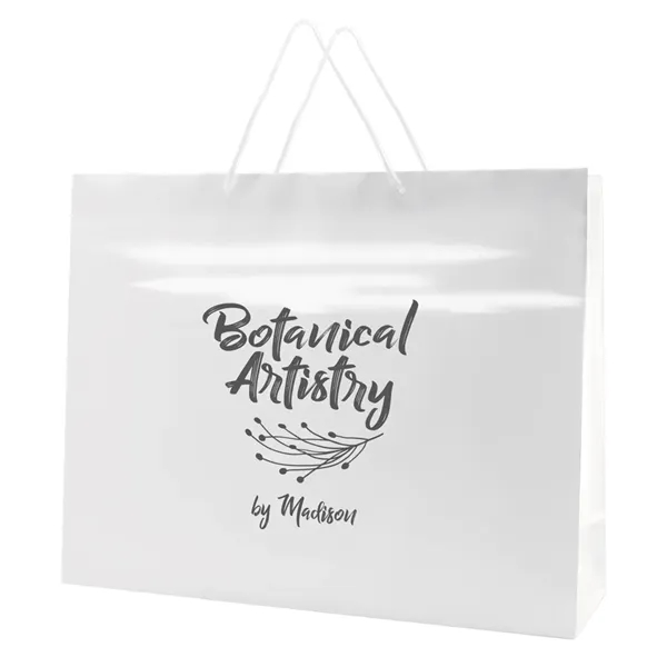Made from 180 GSM gloss laminated paper, these shopping totes feature... from ASI 75731 PWS / Pacific Western Sales/Cater Line