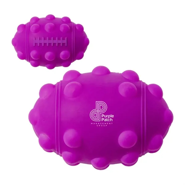 Football shaped silicone fidget ball with dimpled push-pop surface.... from ASI 63549 Jornik Manufacturing Corp