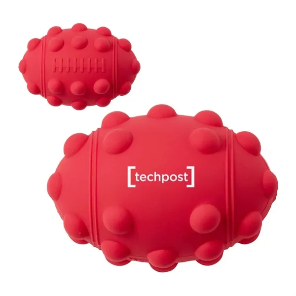 Football shaped silicone fidget ball with dimpled push-pop surface.... from ASI 63549 Jornik Manufacturing Corp