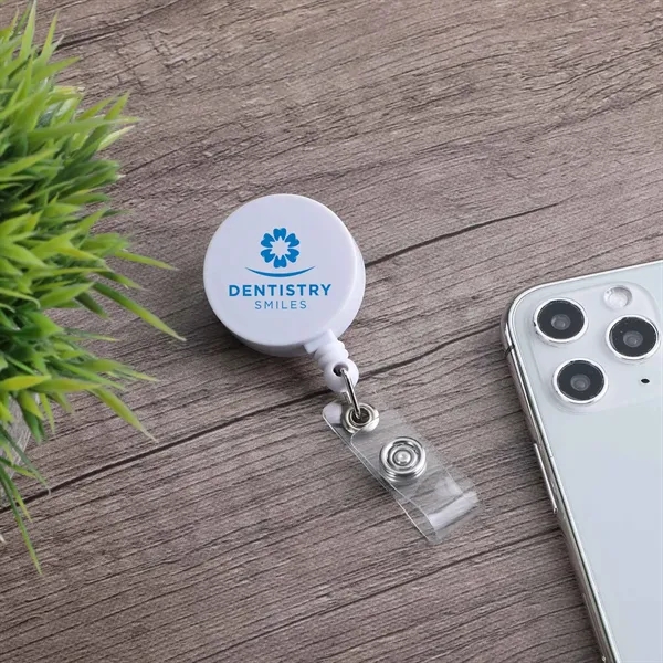 Retractable round swivel badge reel with alligator clip.... from ASI 61966 HPG / Beacon Promotions