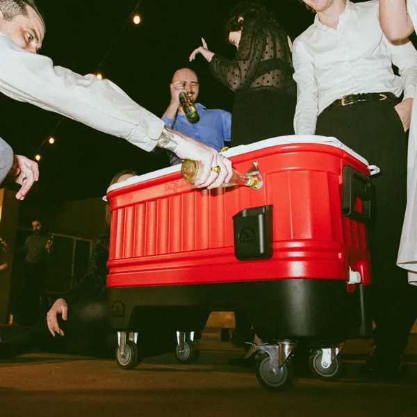 This rolling cooler is part bar cart, part ice chest, and... from ASI 76730 Peerless Umbrella Co Inc