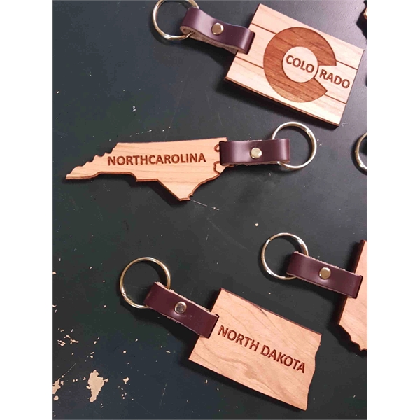 2" North Dakota shaped hardwood keychains with laser engraving; USA-made product.... from ASI 92531 Unique Custom Products / UCP