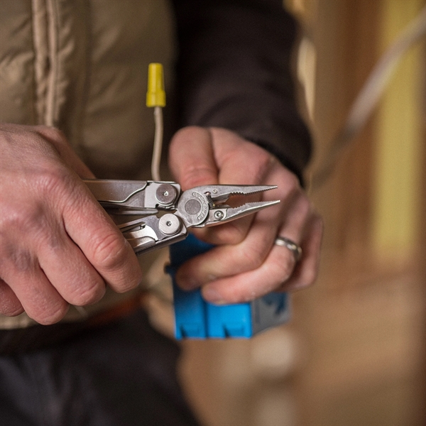 Stainless steel multi-function tool with wire cutters, serrated knife, pliers, saw,... from ASI 46170 Compass Industries Inc