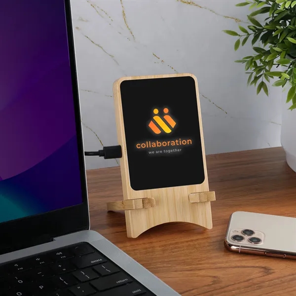 Bamboo wireless charging stand with illuminated logo delivers 15W fast charging... from ASI 61966 HPG / OrigAudio HPG Gold