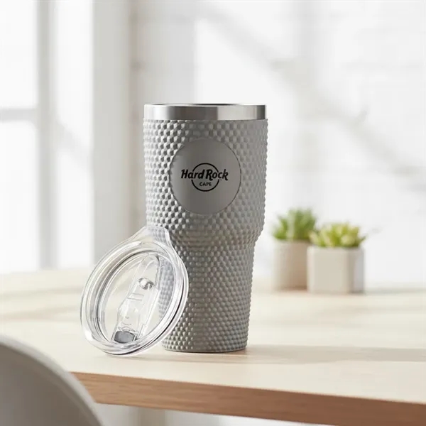 The stylish 27oz Adamas Textured Double Wall Tumbler features a studded... from ASI 84592 St Regis Group