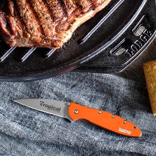 Folding knife in orange with 4" blade and a patented operating... from ASI 46170 Compass Industries Inc