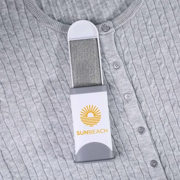 Double sided travel sized lint remover with self cleaning base. Double... from ASI 61966 HPG / Mixie