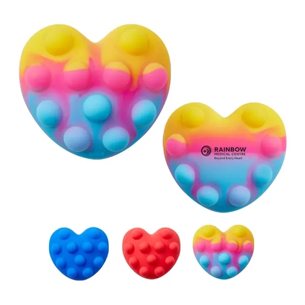 Heart-shaped silicone fidget ball with push-pop, dimpled surface.... from ASI 63549 Jornik Manufacturing Corp