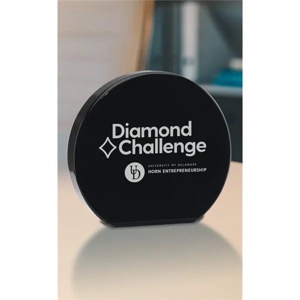 Sleek circular acrylic award with a bold, contemporary silhouette.... from ASI 71920 Moderne Glass Company Inc