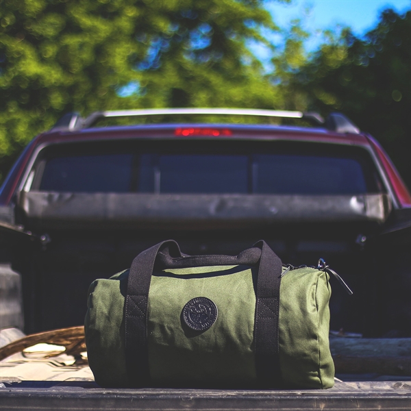 USA Made Round Duffel constructed of durable 15-ounce canvas with a... from ASI 46170 Compass Industries Inc