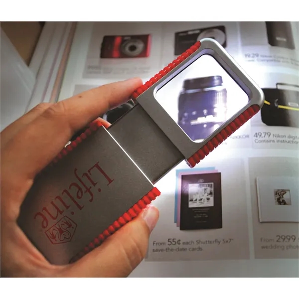Slide-Out Magnifier with Light... from ASI 40480 Koozie Group