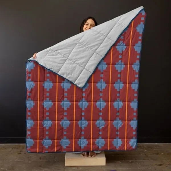 This Soft Block Large Blanket is our inside-only, stay-a-while kind of... from ASI 74710 Numo