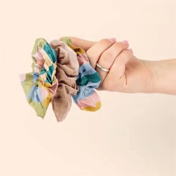 For messy buns, gym runs, and get-it-done energy. The Ripstop Scrunchie... from ASI 74710 Numo