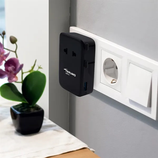 An international travel adapter with an ultra-slim form factor... from ASI 91435 Tomax USA