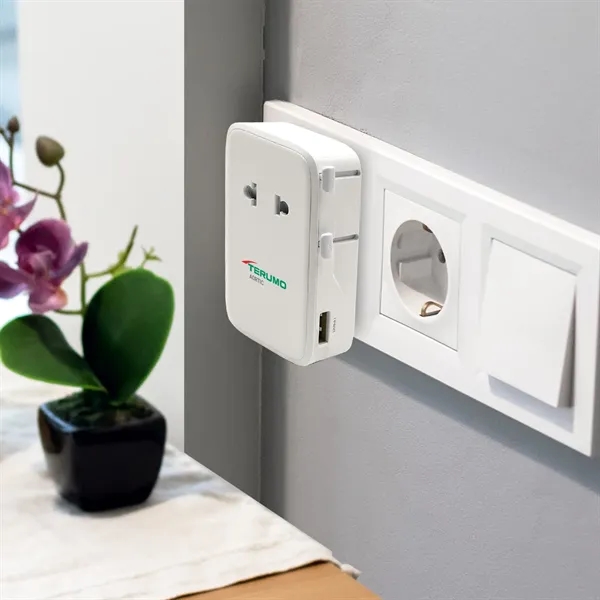 An international travel adapter with an ultra-slim form factor... from ASI 91435 Tomax USA