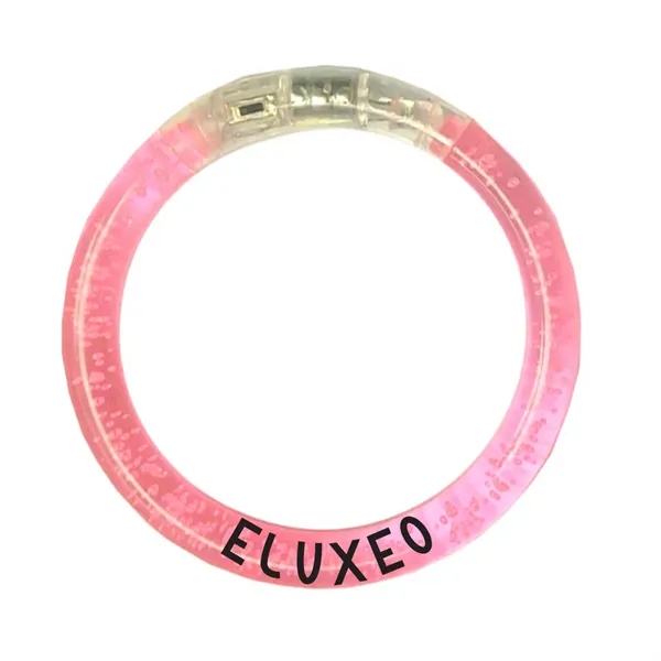Tubular micro-bubble filled bracelet with flashing LED light effect. Button cell... from ASI 63549 Jornik Manufacturing Corp / Jornik