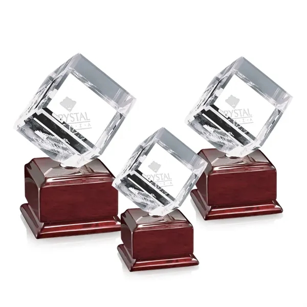 Optical crystal cube award on Radison rosewood base.... from ASI 84592 St Regis Group / St Regis