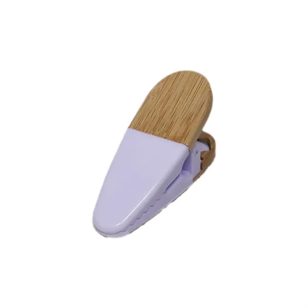 Magnetic clip with Bamboo Grip, spring loaded hinge and powerful magnet.... from ASI 93520 Ventura Inc