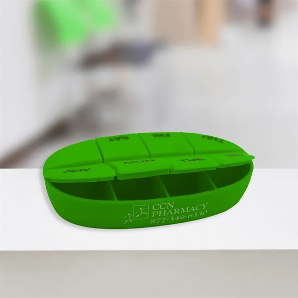 Oval pillbox with eight separate compartments; offered in multiple colors... from ASI 54040 Fey Promo / Mi Line by Fey
