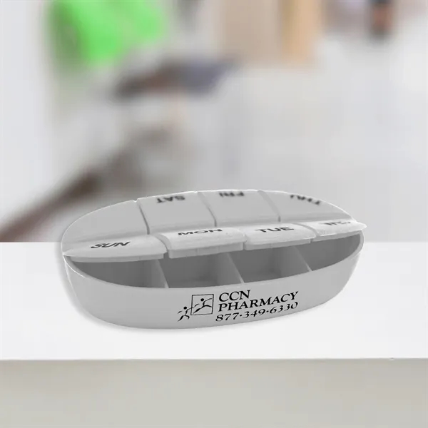 Oval pillbox with eight separate compartments; offered in multiple colors... from ASI 54040 Fey Promo / Mi Line by Fey