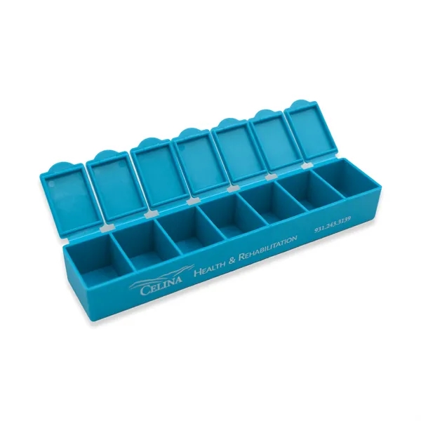 Pillbox with seven separate compartments; offered in several product colors... from ASI 54040 Fey Promo / Mi Line by Fey