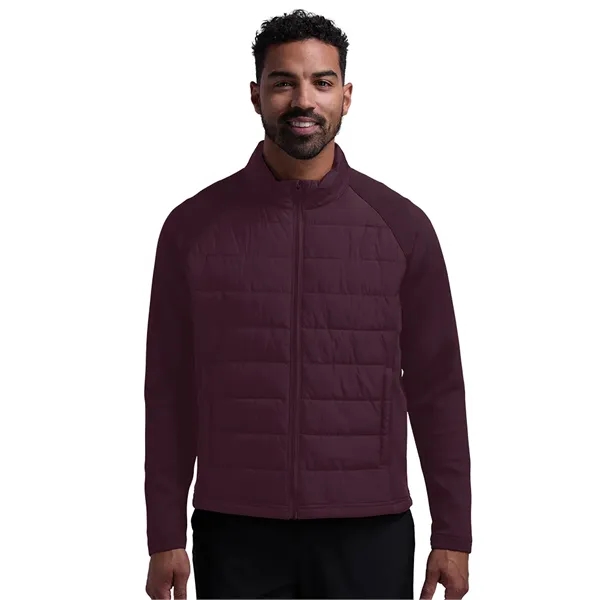 A flexible hybrid layer with a water-resistant quilted front and soft... from ASI 44620 Charles River Apparel