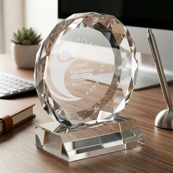 Optical crystal round award with faceted edges on a base.... from ASI 84592 St Regis Group / St Regis
