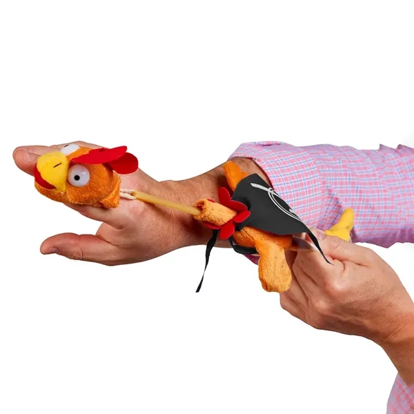 12" flying noise-making rooster toy with sling shot action and cape.... from ASI 63549 Jornik Manufacturing Corp / Jornik