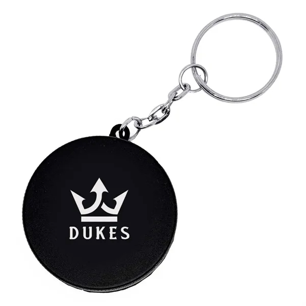 1.5" hockeypuck shaped stress reliever keychain.... from ASI 63549 Jornik Manufacturing Corp