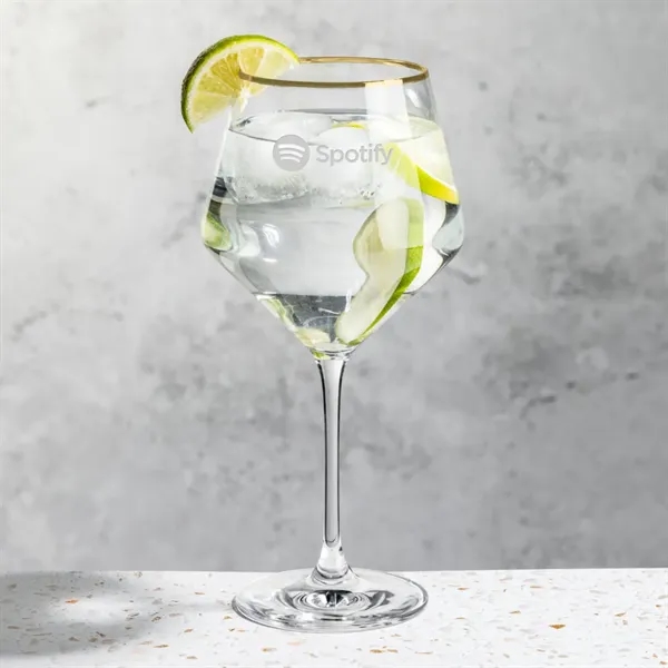 The crystalline Tucson Gold Rim Gin & Tonic Glass showcases a... from ASI 84592 St Regis Group