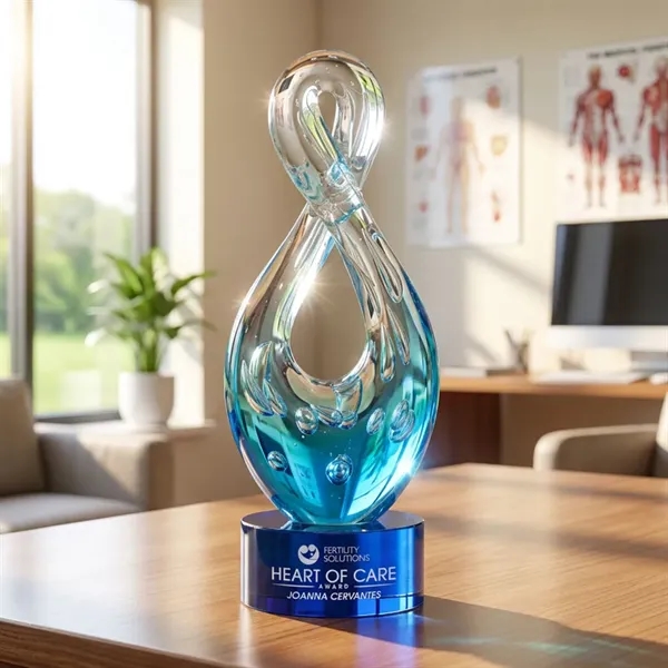 The Utopia Award features a striking, teardrop-inspired loop that twists upward... from ASI 84592 St Regis Group / St Regis