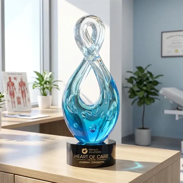 The Utopia Award features a striking, teardrop-inspired loop that twists upward... from ASI 84592 St Regis Group / St Regis