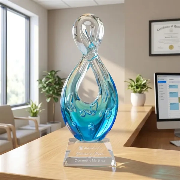 The Utopia Award features a striking, teardrop-inspired loop that twists upward... from ASI 84592 St Regis Group / St Regis