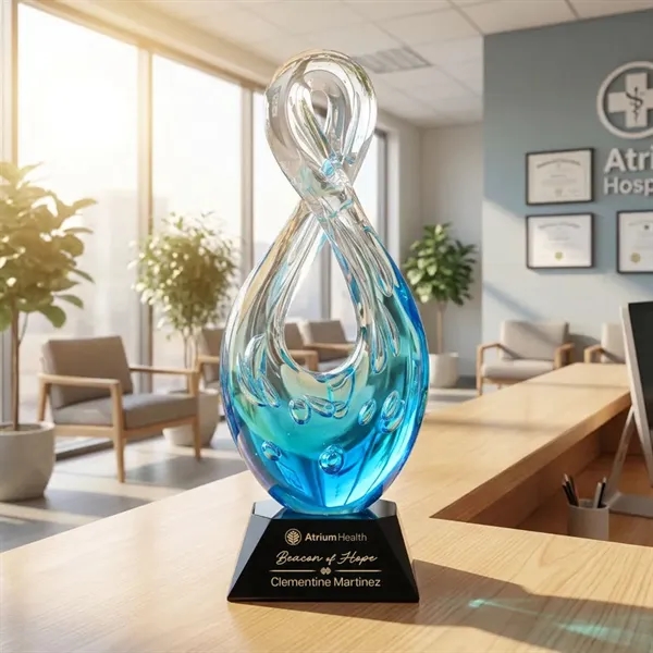 The Utopia Award features a striking, teardrop-inspired loop that twists upward... from ASI 84592 St Regis Group / St Regis