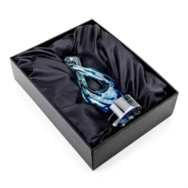 The Utopia Award features a striking, teardrop-inspired loop that twists upward... from ASI 84592 St Regis Group / St Regis