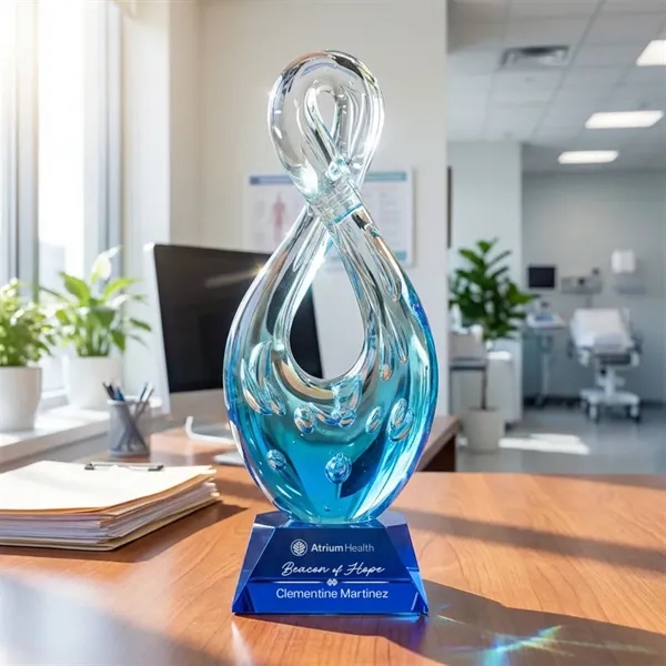 The Utopia Award features a striking, teardrop-inspired loop that twists upward... from ASI 84592 St Regis Group / St Regis