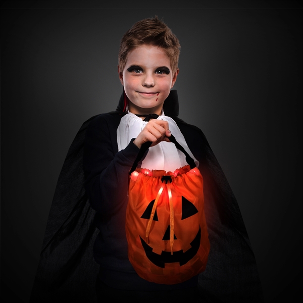 Light-up trick-or-treat pumpkin bag with 6 red LED lights along the... from ASI 42016 Brighter Promotions Inc