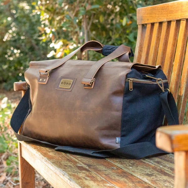 Leather duffle comes with handles, shoulder strap, 35-liter capacity, secure zippered... from ASI 61966 HPG / OrigAudio