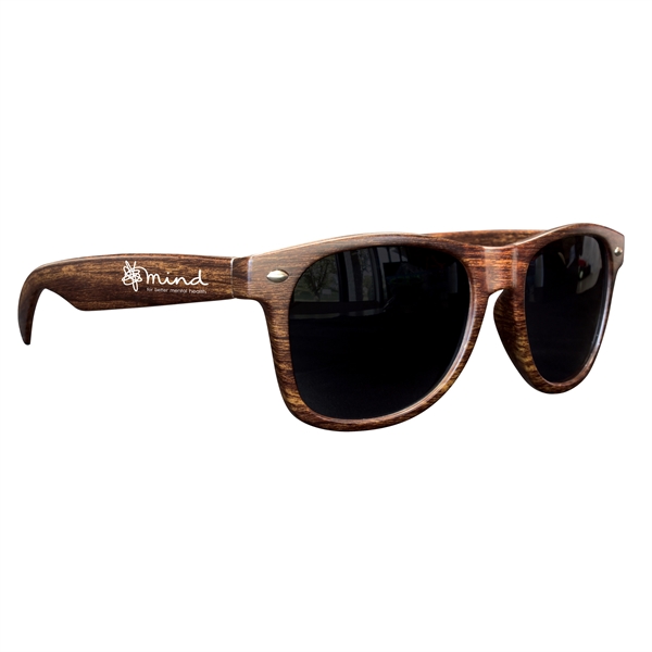 Medium wood tone sunglasses made of polycarbonate with rubberized finish; includes... from ASI 90807 Tekweld