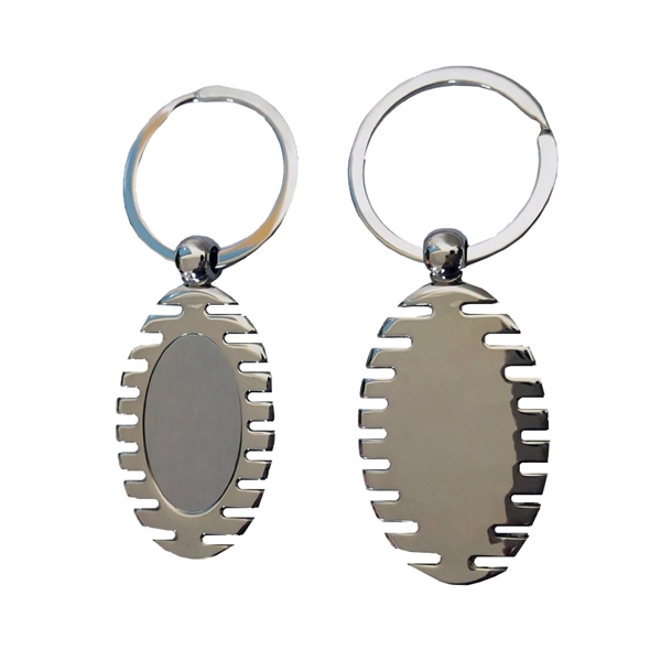 2.09" x 1.14" x 0.14" stylized nickel-plated zinc alloy oval metal... from ASI 37218 Athena Promo (tm)