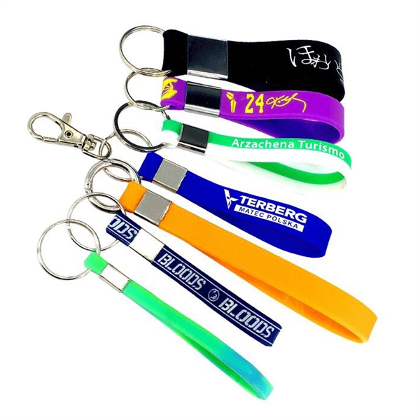 8.66" x .47" x .08" silicone wristband and keyring plus 1... from ASI 37218 Athena Promo (tm)