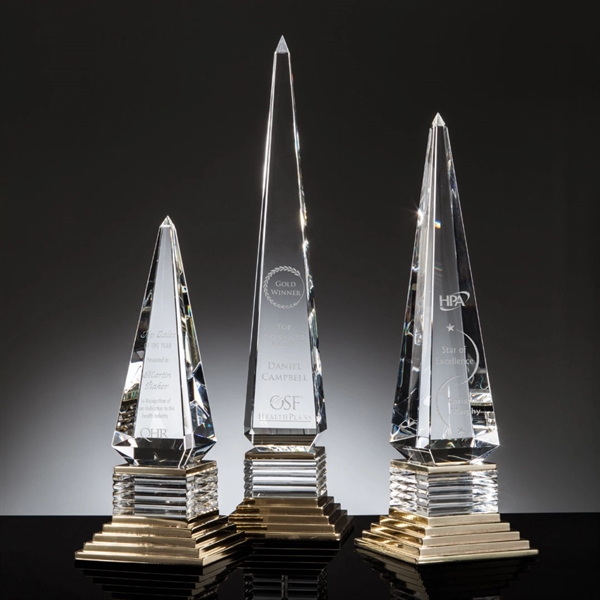 An obelisk shape is given dramatic transformation for the Tribune award... from ASI 84592 St Regis Group / R S Owens & Co Inc
