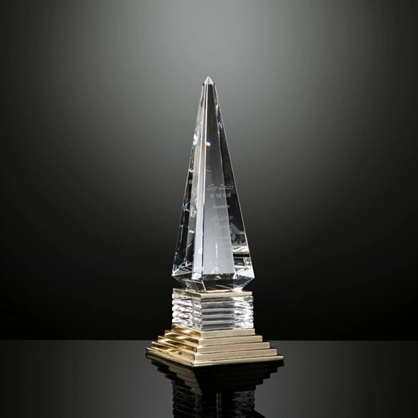 An obelisk shape is given dramatic transformation for the Tribune award... from ASI 84592 St Regis Group / R S Owens & Co Inc