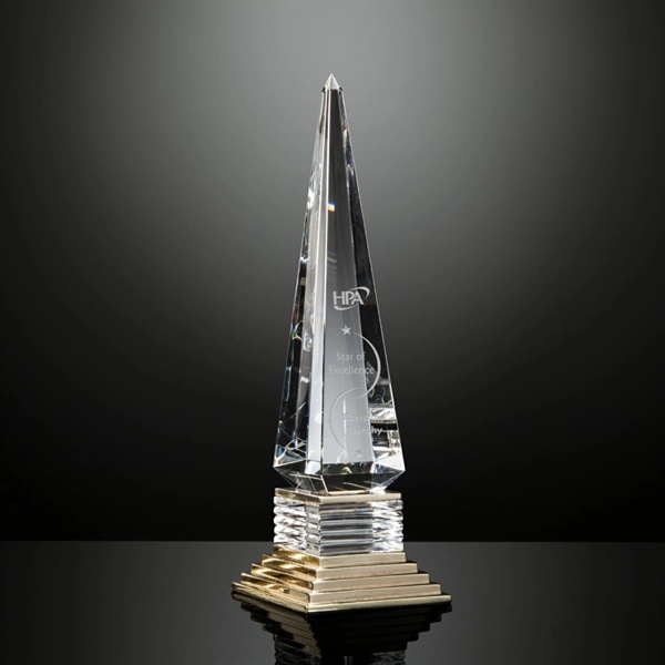 An obelisk shape is given dramatic transformation for the Tribune award... from ASI 84592 St Regis Group / R S Owens & Co Inc
