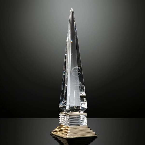 An obelisk shape is given dramatic transformation for the Tribune award... from ASI 84592 St Regis Group / R S Owens & Co Inc