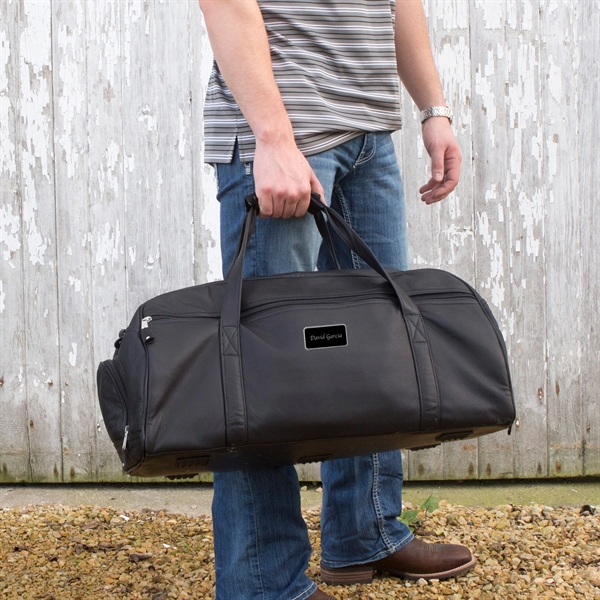 Leather duffel bag with a generous main compartment, zip closure and... from ASI 61966 HPG / Beacon Promotions