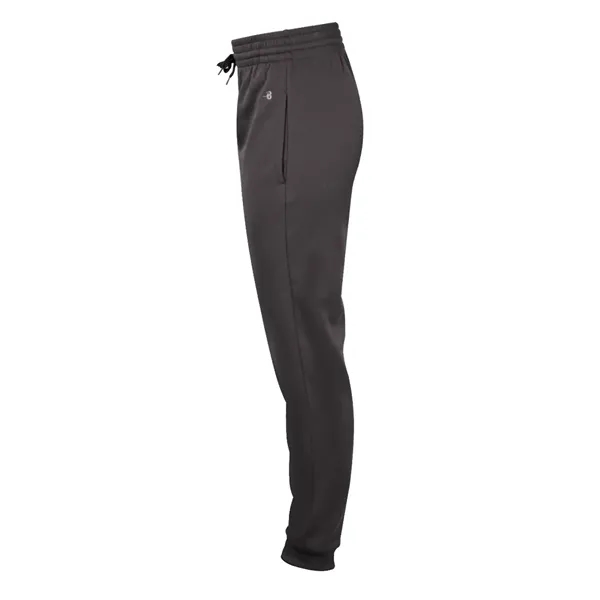 Women's jogger pants with tapered fit in lower leg, reinforced spandex... from ASI 37461 Augusta Sportswear