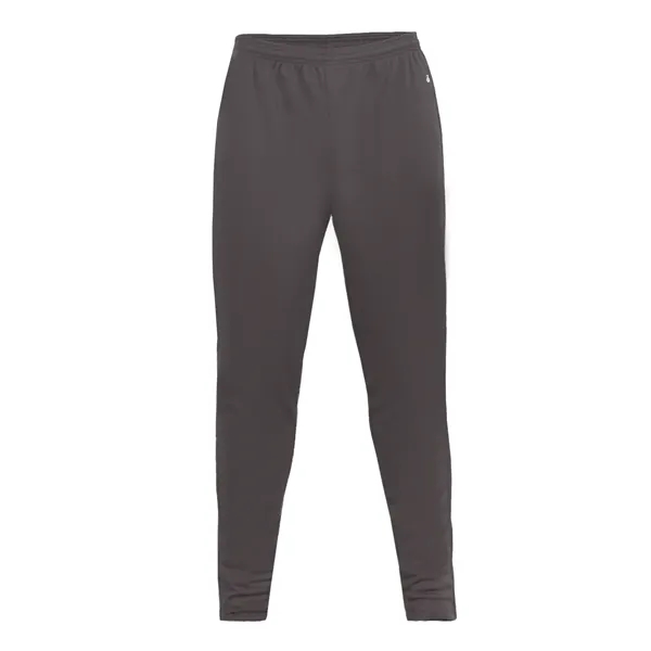 Pants with tapered fit in lower leg, 12" zippers on each... from ASI 37461 Augusta Sportswear